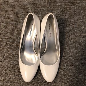 High heeled white shoes